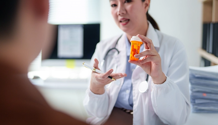 pharmacist educating patient